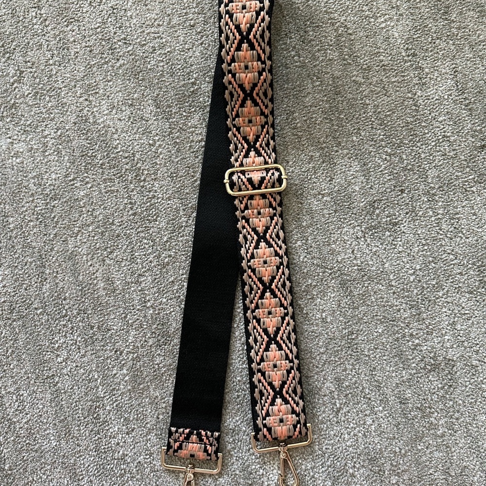 Ahdorned purse interchangeable cross body strap